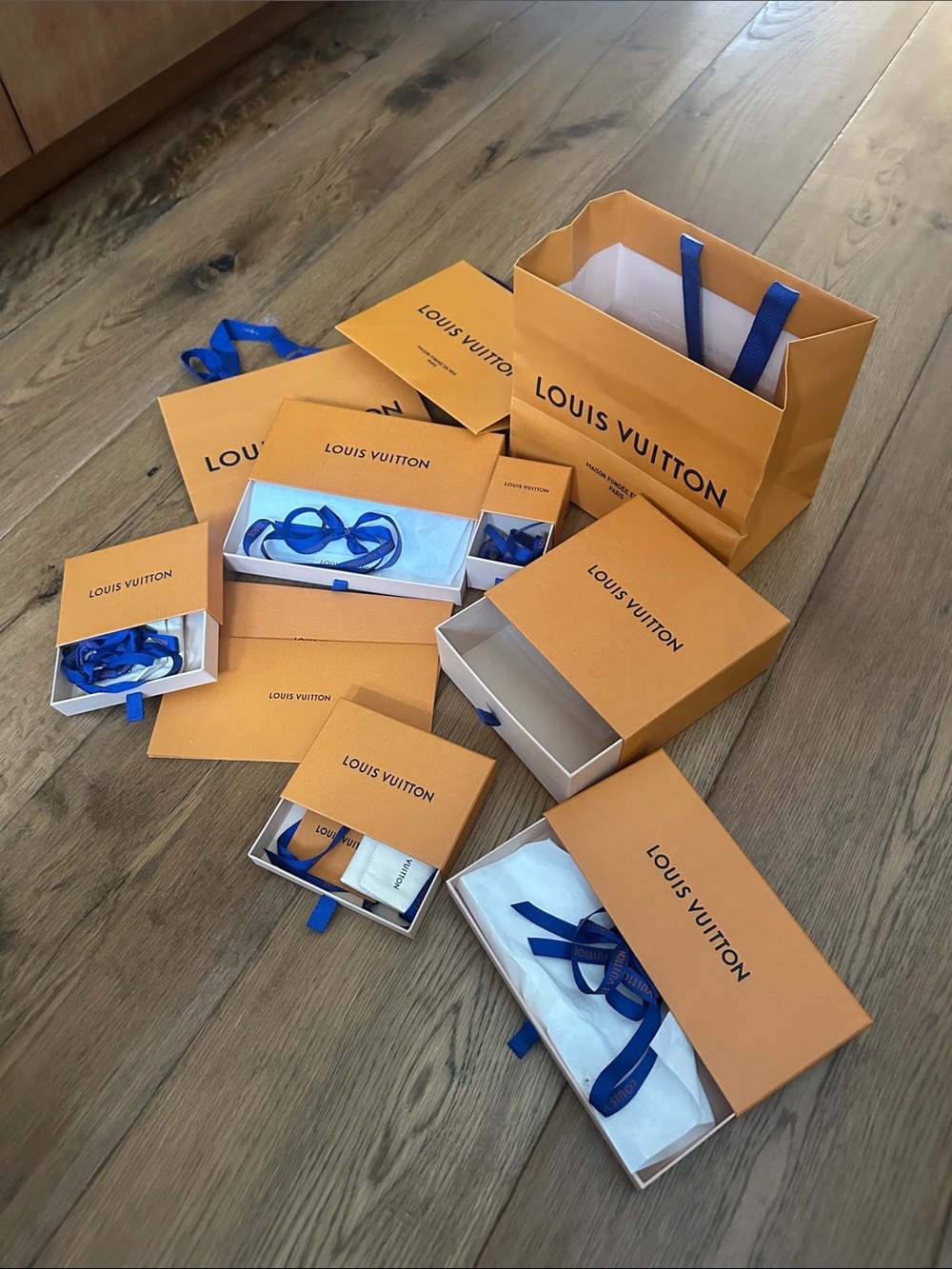 Louis Vuitton Orange Gift Boxes with Blue Ribbon Accents